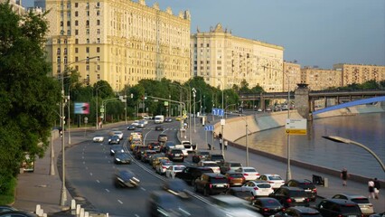 City traffic on the Smolenskaya embankment along the Moscow river. Timelapse