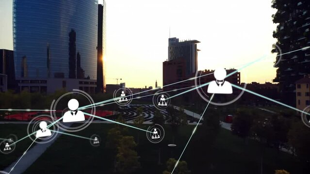 Animation of network of connections with icons over cityscape