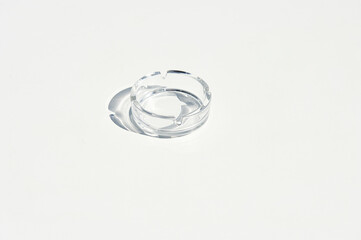 Fototapeta premium glass ashtray on white formica table