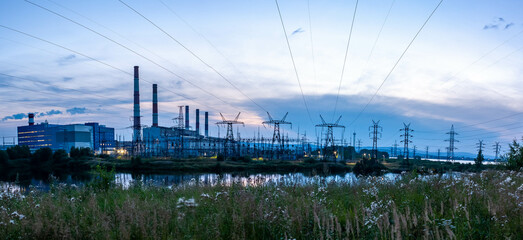 Fototapeta na wymiar Verkhnetagilskaya GRES - power plant. August 2022 Верхнетагильская ГРЭС - электростанция. Август 2022 год. 