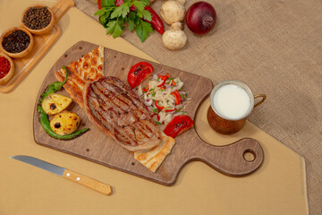 Delicious Turkish Traditional Kebab cutlet with grilled tomato on white plate stock photo
Above, Angle, Animal, Barbecue - Meal, Beef