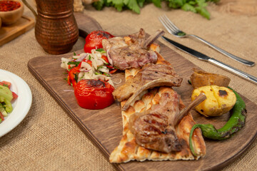 Lamb chop and vegetables on wooden table stock photo
Adana, Barbecue - Meal, Beef, Belgium, Bread