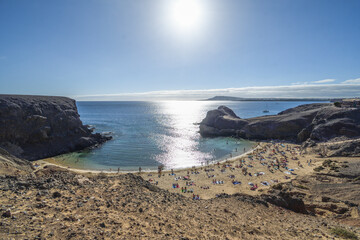 sunset at Playa Papagayo with Playa Blanca in the background
