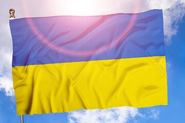 Ukraine flag symbol on blue sky. Yellow-blue Ukrainian state flag, Independence Day National day.