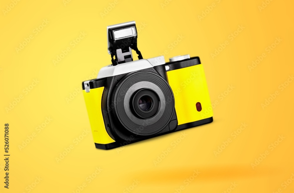 Poster Creative vintage camera floating on background. Concept art. Minimal summer idea.