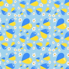 seamless pattern, blue and yellow hearts with daisies 