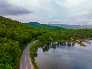 Obraz premium Stinson Lake aerial view in White Mountain National Forest in summer in town of Rumney, Grafton County, New Hampshire NH, USA. 