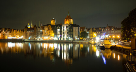 Fototapeta na wymiar Picturesque summer evening panorama of the architectural pier of the Old Town GDANSK, POLAND