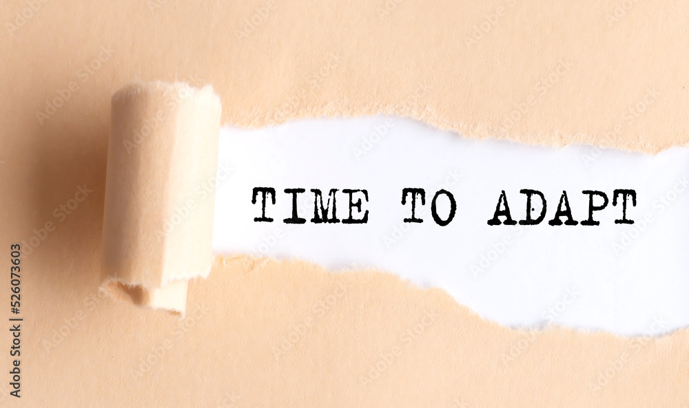 Poster the text time to adapt appears on torn paper on white background.
