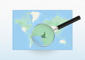 Naklejka premium Map of the World with a magnifying glass aimed at Cameroon, searching Cameroon with loupe.