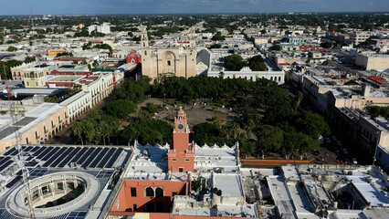 Aerial view over the Merida city hall, zocalo or plaza grande to the cathedral San Ildefonso in Merida, Yucatan, Mexico.