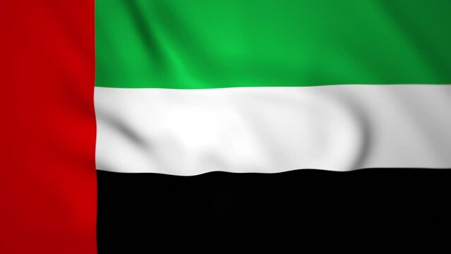 Waving colorful flag of United Arab Emirates. Emirate flag is blowing in the wind