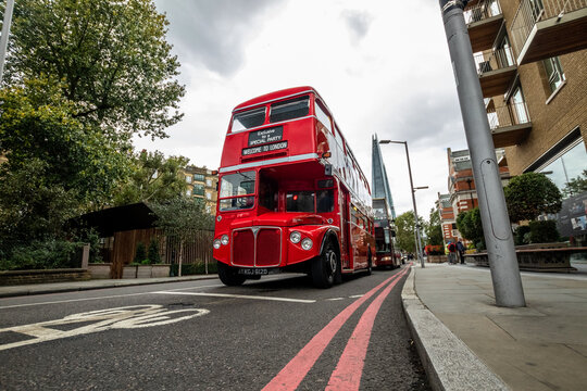 Red double decker bus in the streets of London