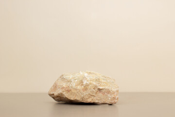 empty nature stone podium minimalism on light beige background. Copy space, place for text