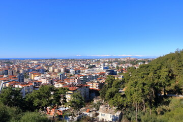 Manavgat city aerial panoramic view in Antalya region in Turkey from the Türkbeleni Ormani, turkish flag monument