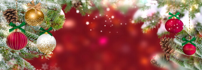 Obraz na płótnie Canvas Christmas tree and red ball on festive blurred holiday background banner template copy space 