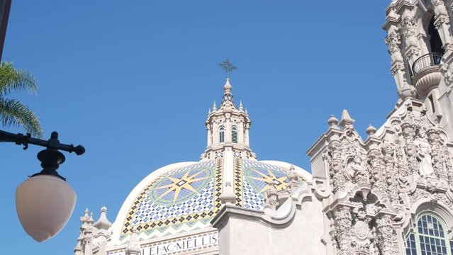 Spanish colonial revival architecture in Balboa Park, San Diego, California USA. Historic building, classic baroque or rococo romance style. Bell tower or belfry relief decor and mosaic dome or cupola