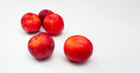 Ripe autumn soft juicy plums isolated on a white background