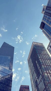 Vertical Video of city skycrapers on a sunny day