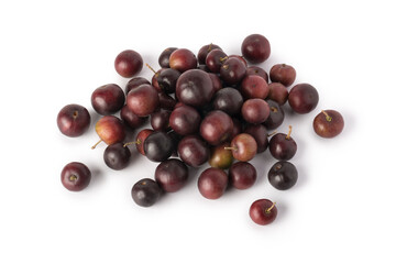 heap of governor's plum fruits, flacourtia indica, also known as ramontchi, madagascar plum or indian plum, reddish black fleshy fruits isolated on white background