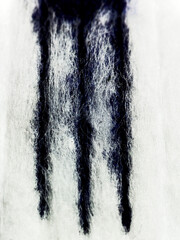 macro texture of blue paint on white fabric