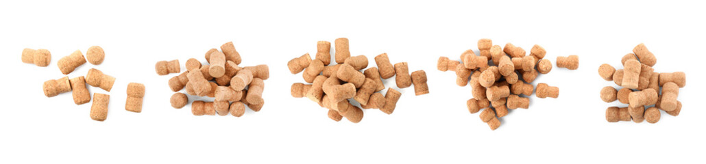 Set with corks of sparkling wine bottles on white background, top view. Banner design
