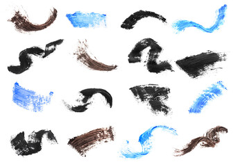 Set with different mascara strokes on white background