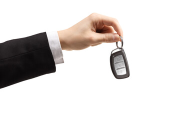 Male hand in a suit and white shirt holding car keys