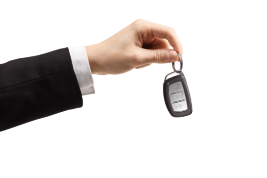 Male hand in a suit and white shirt holding car keys