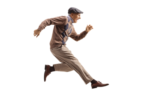 Excited elderly man jumping and kicking