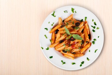 Penne pasta. Cooked italian pasta on background,