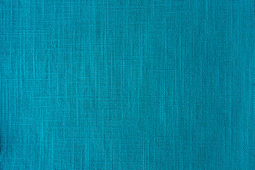 teal green fabric texture background, pattern. Abstract desig of linen sack textile canvas burlap cloth. Close-up, mock up, top view, Empty colourful wall texture with copy space for text overlay