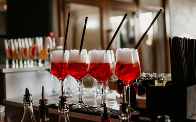A glass of Aperol Spritz at a beautiful wedding day.