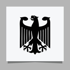 Vector illustration of a black eagle on white paper which is perfect for logos, business cards, emblems and icons