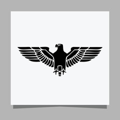 Vector illustration of a black eagle on white paper which is perfect for logos, business cards, emblems and icons