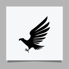 Vector illustration of a black eagle on white paper which is perfect for logos, business cards, emblems and icons