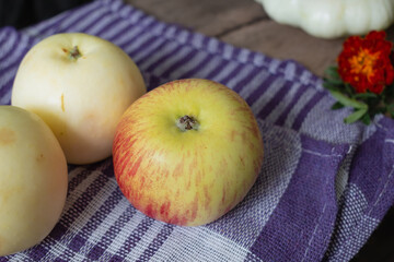 Top view of apples lying in the kitchen. Autumn fruits in the ro