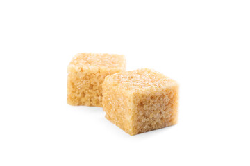Two brown sugar cubes isolated on white