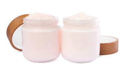 Jars of face cream isolated on white