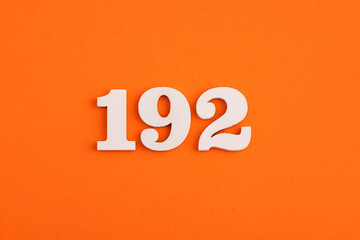 Number 192 - On orange foam rubber background