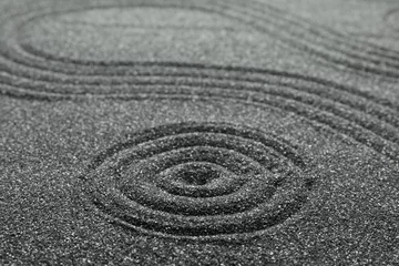 Fotobehang Zen Pattern on decorative black sand, closeup. Zen and harmony  © New Africa