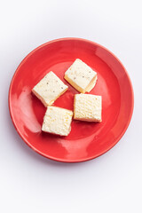 Kharvas or Cheek, Chik, Bari, Pis or Junnu is a sweet dairy product made from bovine colostrum