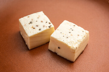 Kharvas or Cheek, Chik, Bari, Pis or Junnu is a sweet dairy product made from bovine colostrum