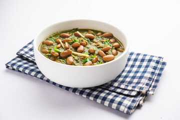 Palak rajma Masala is an Indian curry prepared with red kidney beans & spinach cooked with spices