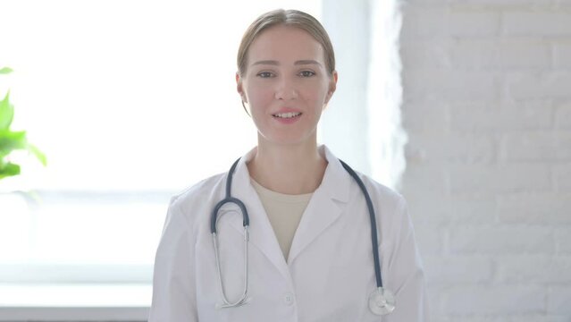 Lady Doctor Waving Hand to Say Hello