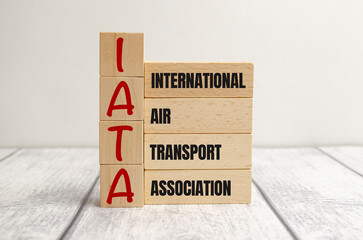 wooden cube block with IATA business word on table background. Mission, Vision and core values concept
