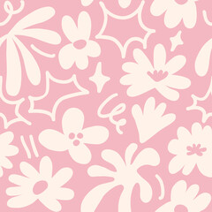 Abstract seamless pattern with cute hand drawn meadow flowers. Stylish natural background. Hand drawn design elements.