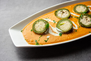 Shaam Savera is a spinach kofta curry where stuffing is made from paneer and the kofta made from spinach