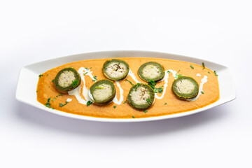 Shaam Savera is a spinach kofta curry where stuffing is made from paneer and the kofta made from spinach