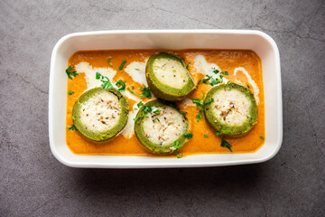 Shaam Savera is a spinach kofta curry where stuffing is made from paneer and the kofta made from spinach